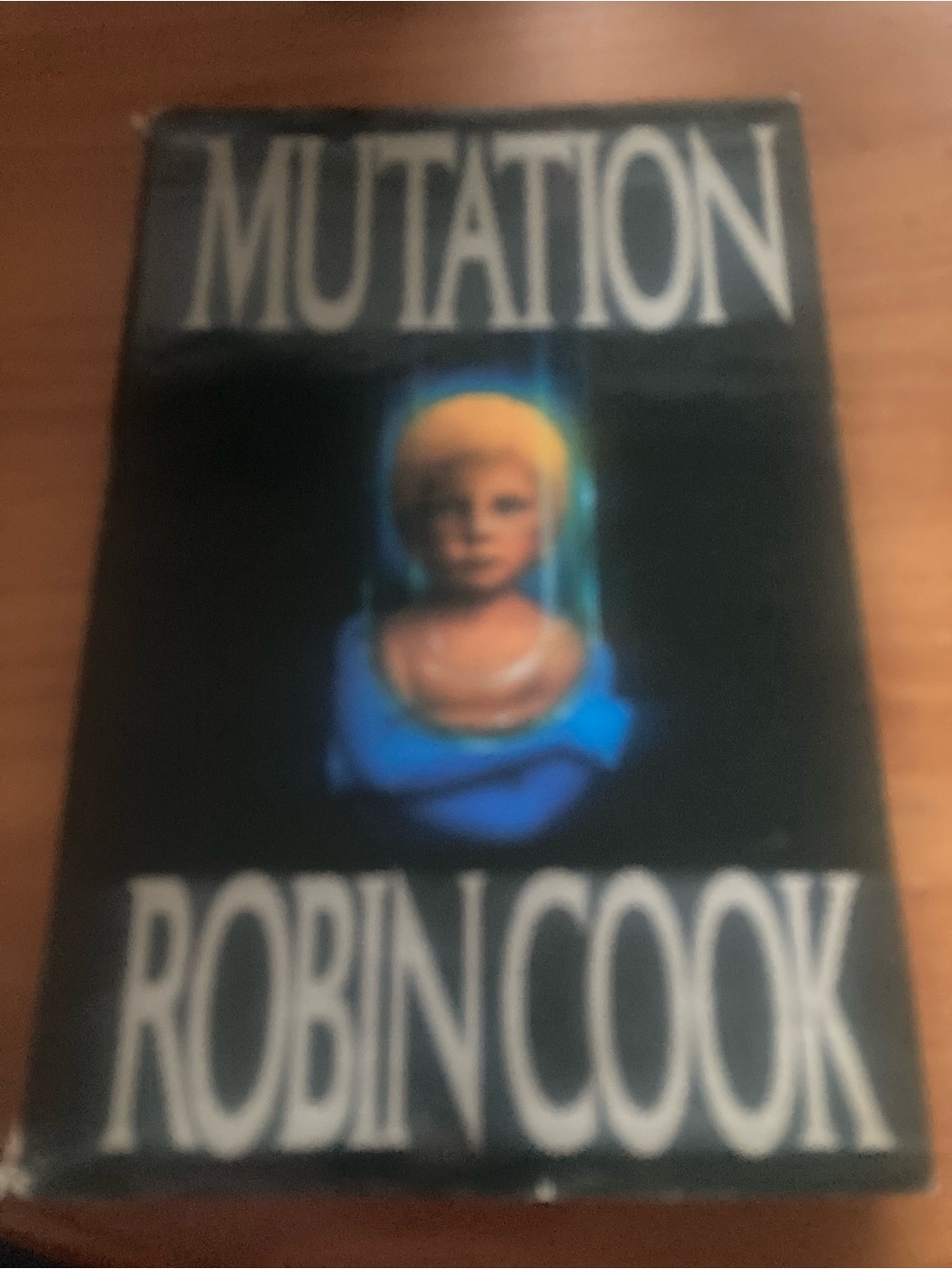 Mutation by Robin Cook - Black Cover with Blue Accent